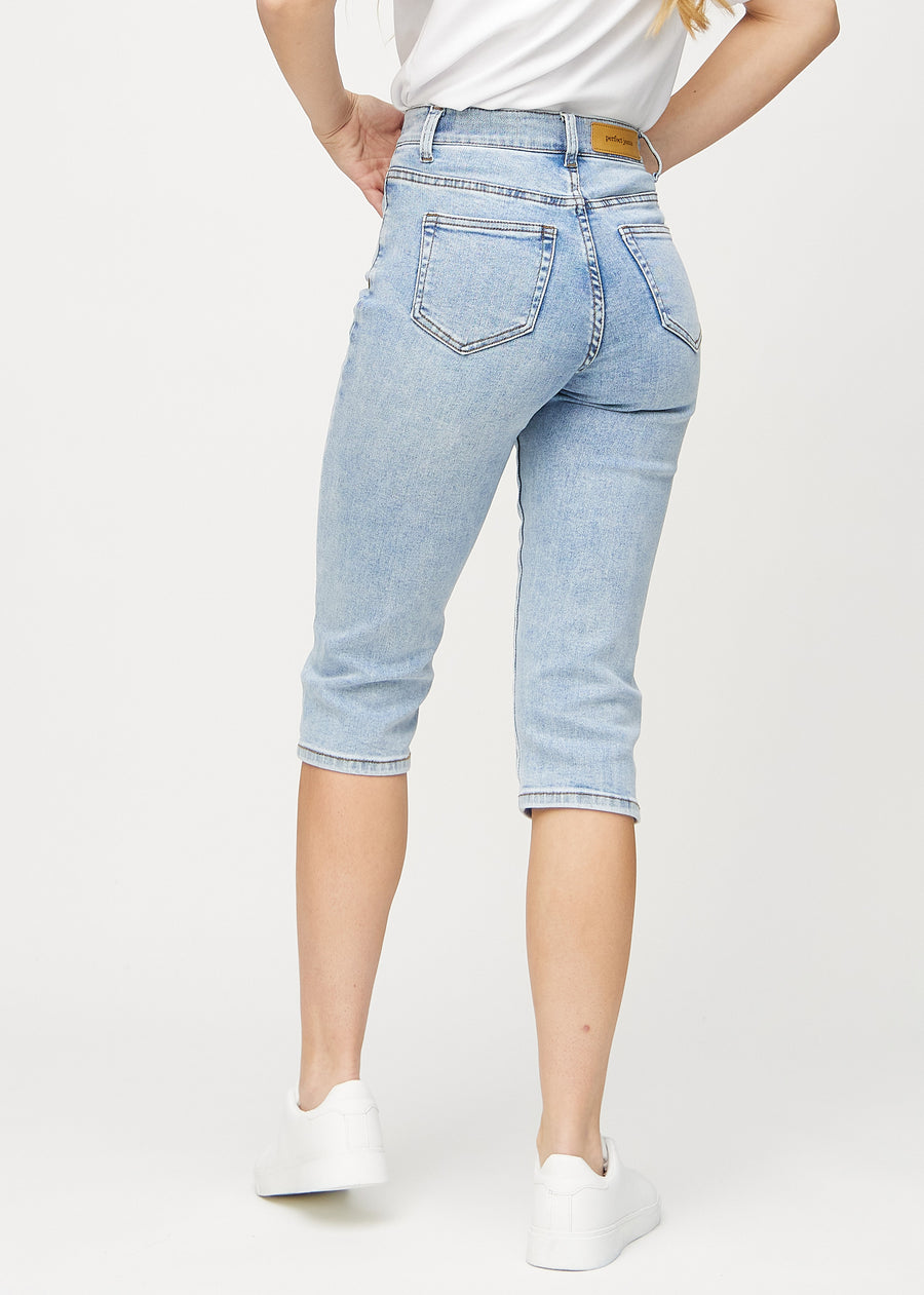 Light denim regular capris seen from the back, so the entire product can be seen.