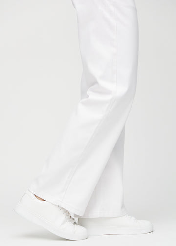 The ankles of a model, so you can see how loose the jeans fit.