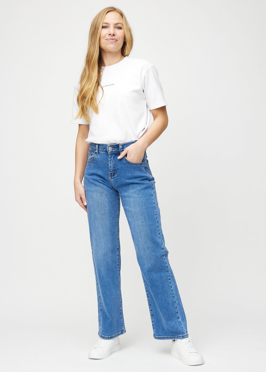Full image of model in denim loose jeans.