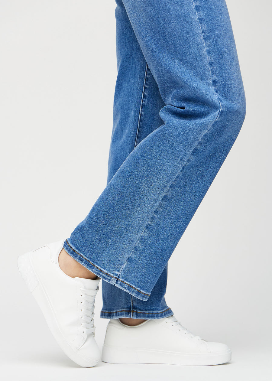 The ankles of a model, so you can see how loose the jeans fit.
