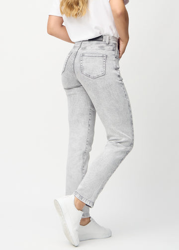 Regular jeans for women in light grey, color Ashes. Back view on a model, showing the full fit.